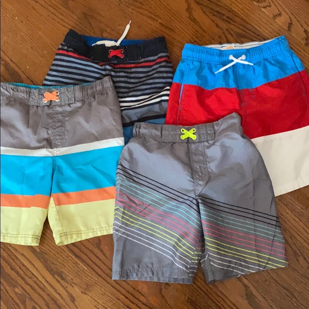 4 Boys bathing suit trunks -size 8-10